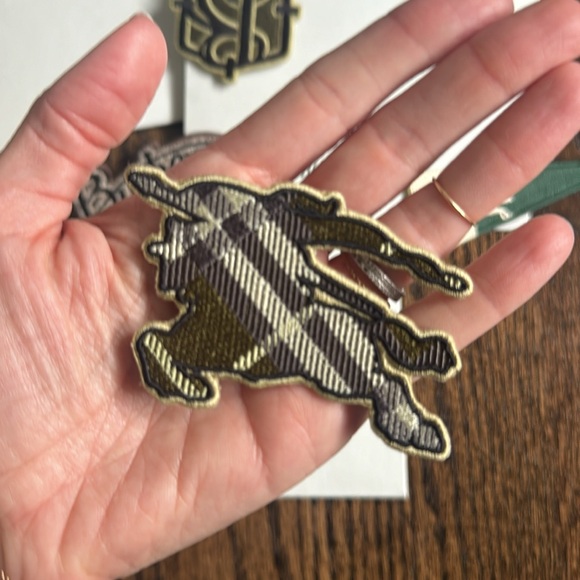 Authentic Burberry patches, given at a Burberry event. There are 4. - Picture 3 of 5